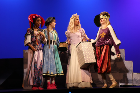 The Minstrel (Riley Elwess), the Jester (Dahnielle Florestant), and the King (Piper Crain) convince Lady Larken (Hollyn Anderson) to run away from the kingdom.
