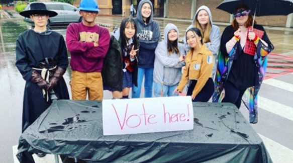 Participants around the voting table at the end of the event!