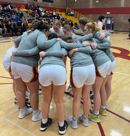 pre-game huddle where the falcons prepare to defeat their opponent. 