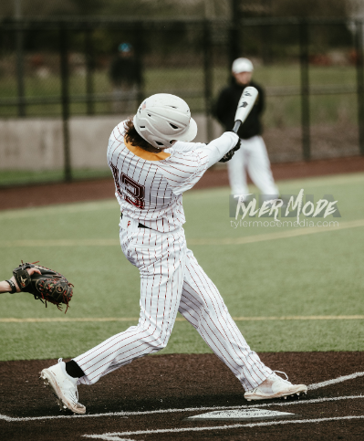 Brady Trombello swings at the ball at the jamboree at Ridgefield.