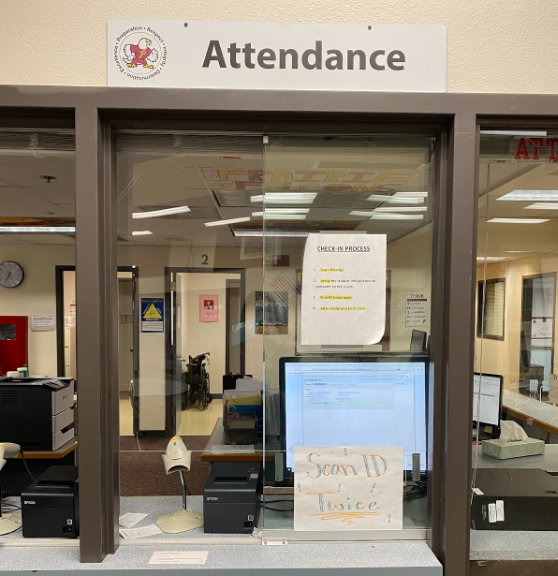 Attendance Office window where students scan their IDs for their tardy passes.  