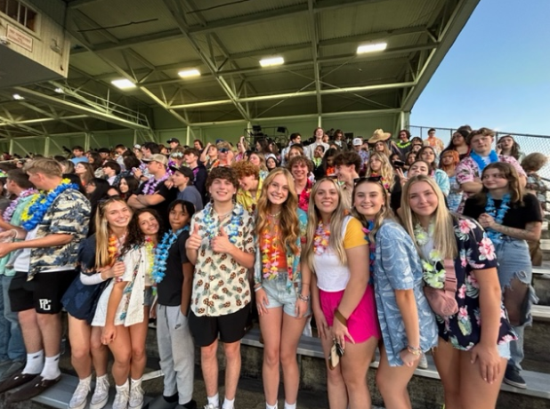 Falcon+student+section+in+their+best+tropical+gear+on+September+1%2C+2023.+