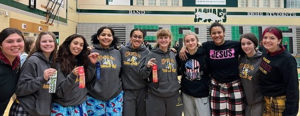 The girls team showing off their medals after a successful placing in the Wyatt Draper tourney, 