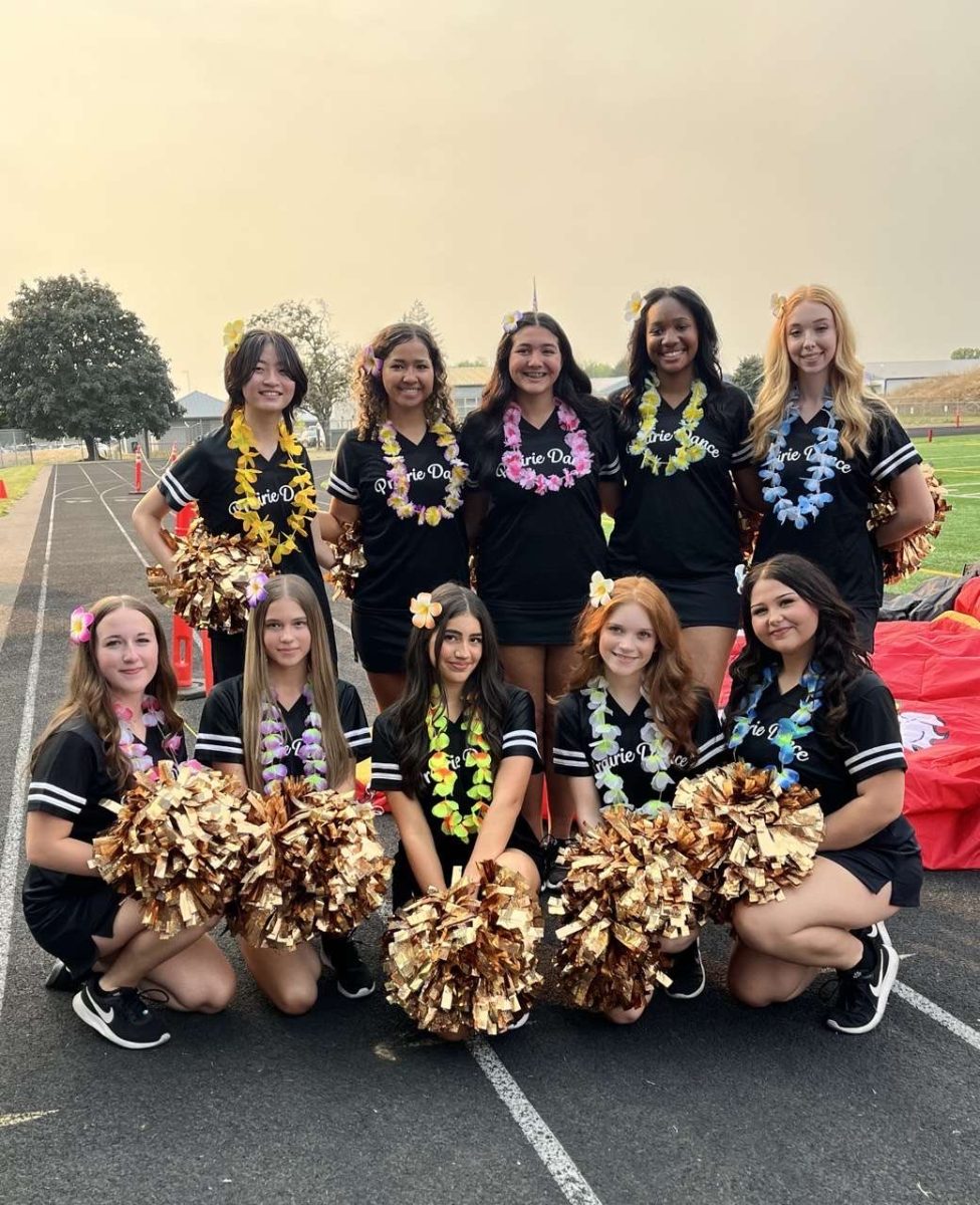 Prairie High School's Varsity dance team at a home game at District Stadium against the Ridgefield Spudders.