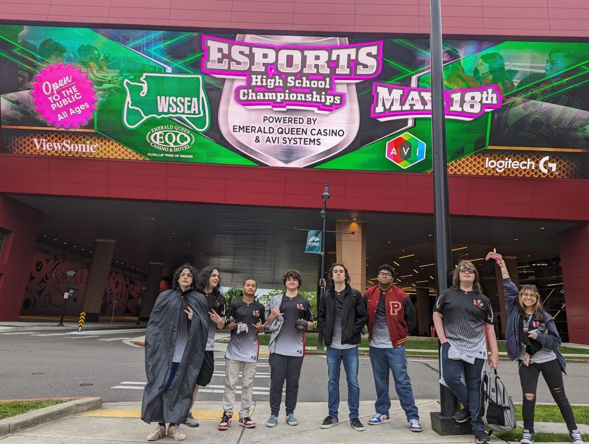 Varsity ESports team posing outside 2024 ESports High School Championships.