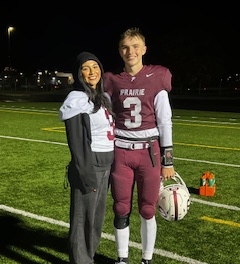 Prairie’s Deven Vigue (3) with girlfriend, Itzel Contreras Montiel, after defeating the Heritage Timberwolves to end the league season (3-2). Friday, Nov 1, 2024, to take third in 3A Greater St. Helens league football. 