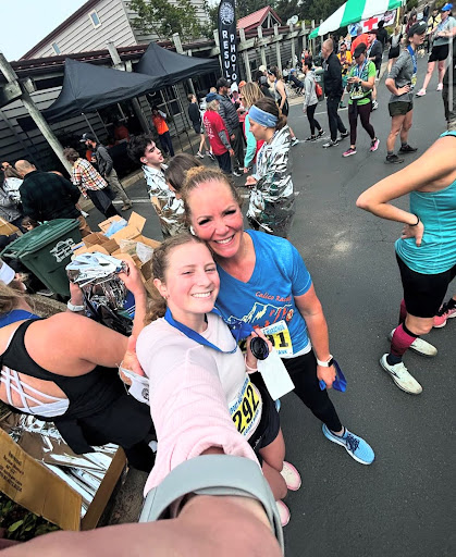 Zoe Jensen taking a post race picture with her mom.