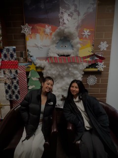 Prairie students, Lenna Dang and Yureicy Jimenez-Cifuentes pose with PHS library yeti.