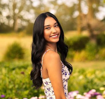 Chailya posing for her senior portraits						
