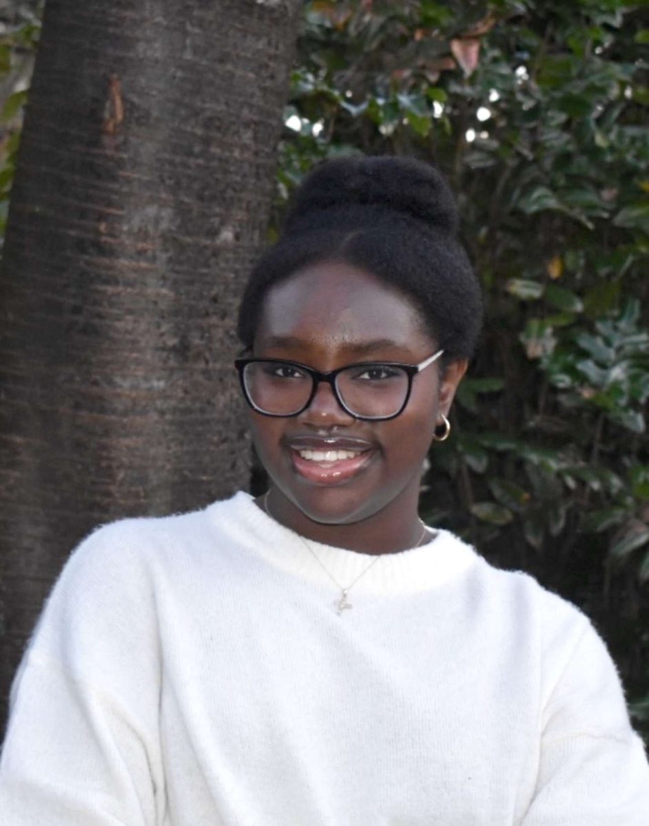 Efe Otoikhian posing for a senior photo.