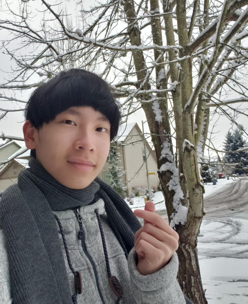 A Selfie of Michael Kue outside in the Snow on Valentines Day.