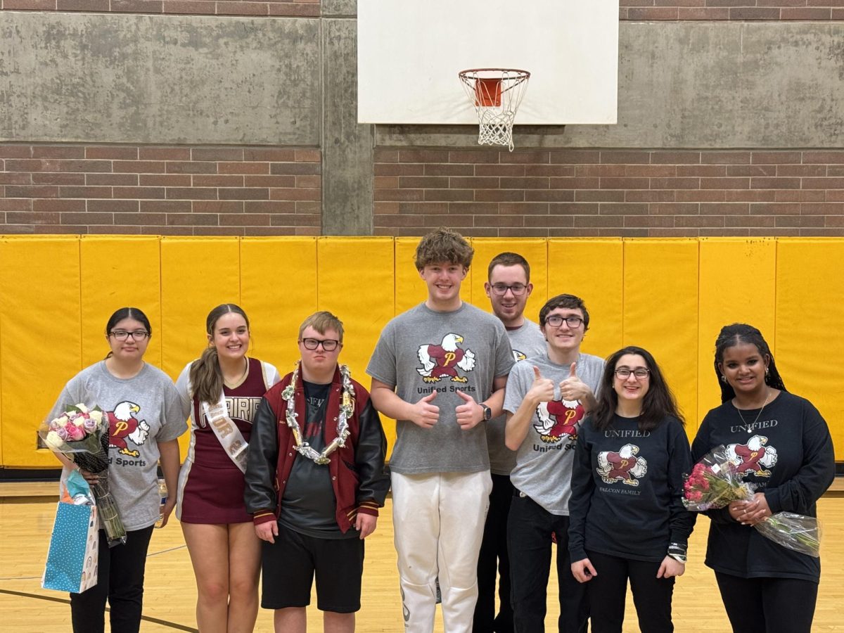 Unified Basketball Seniors Smiling at Senior Night!