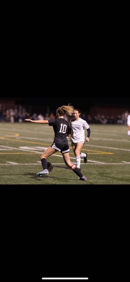 Jules Staley (10) taking on a defender at a ‘24 season home game against Evergreen High School.