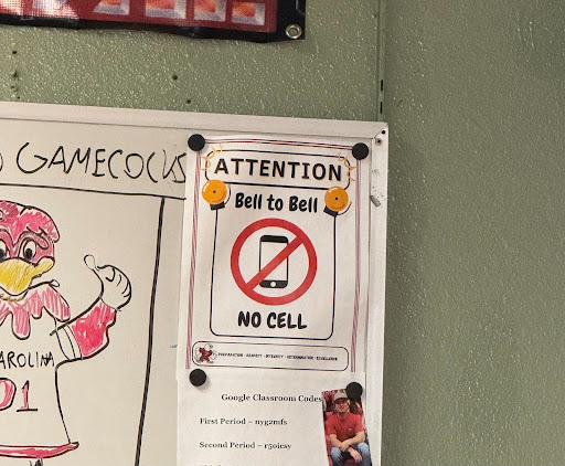 The no cell phone signs hung up in Prairie classrooms.