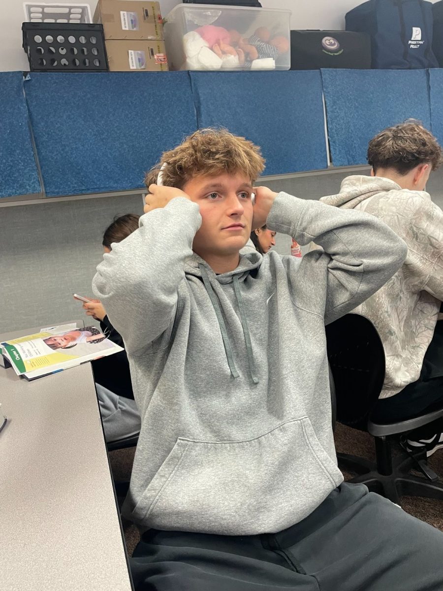 Jackson Paris (12) listening to music during class. “This song I can really feel in my bones.” Jackson was in Prairie Preschool third period December first in class, happily playing September by Earth Wind & Fire.