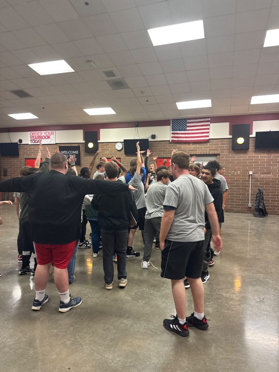The Unified Basketball team breaks out of practice.