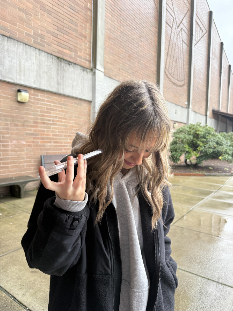 Prairie high school student Daphne Dirks listens to new Daniel Caesar album.