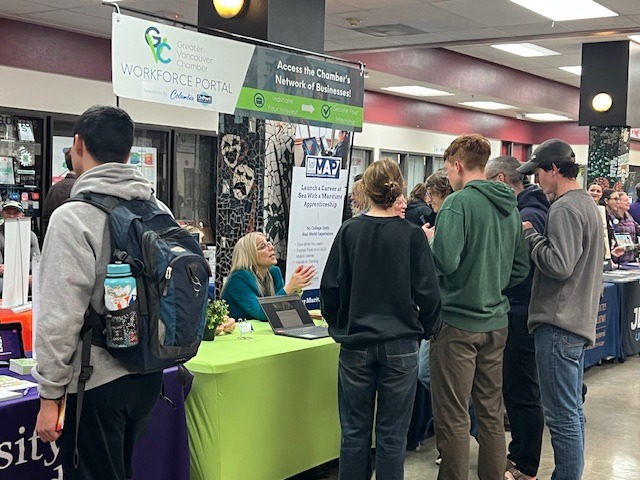 Students at one of the many stands the College and Career Fair had to offer.