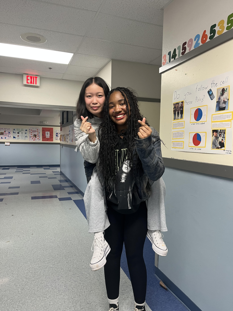 ASB's president and vice president duo pose to remind you 
To show your school spirit for the upcoming winter spirit week
