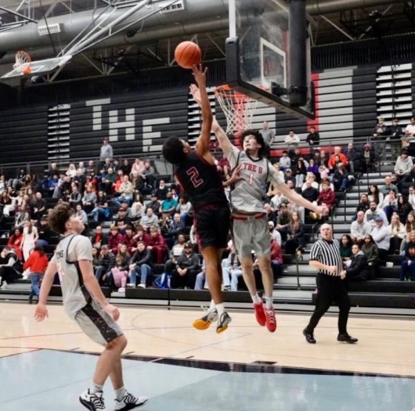 Jamir Jones, number 2, goes up for a layup against Union.
