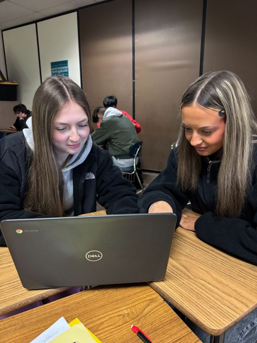 “Students Trinity Cates and Daphne Dirks working on their project together during Wednesday’s Falcon Flight Time.”
