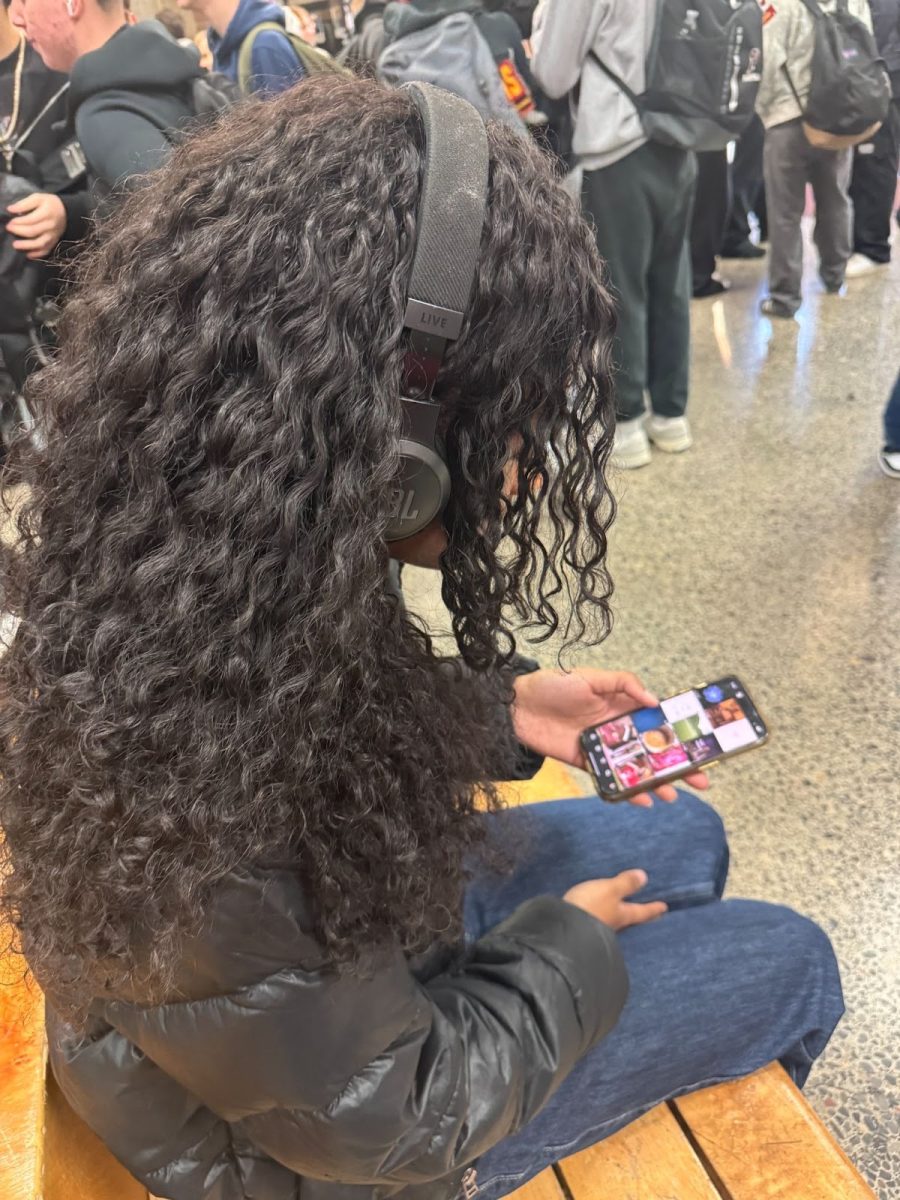 
“Student Verlaiya Kelly, seen on Instagram before class starts.”

