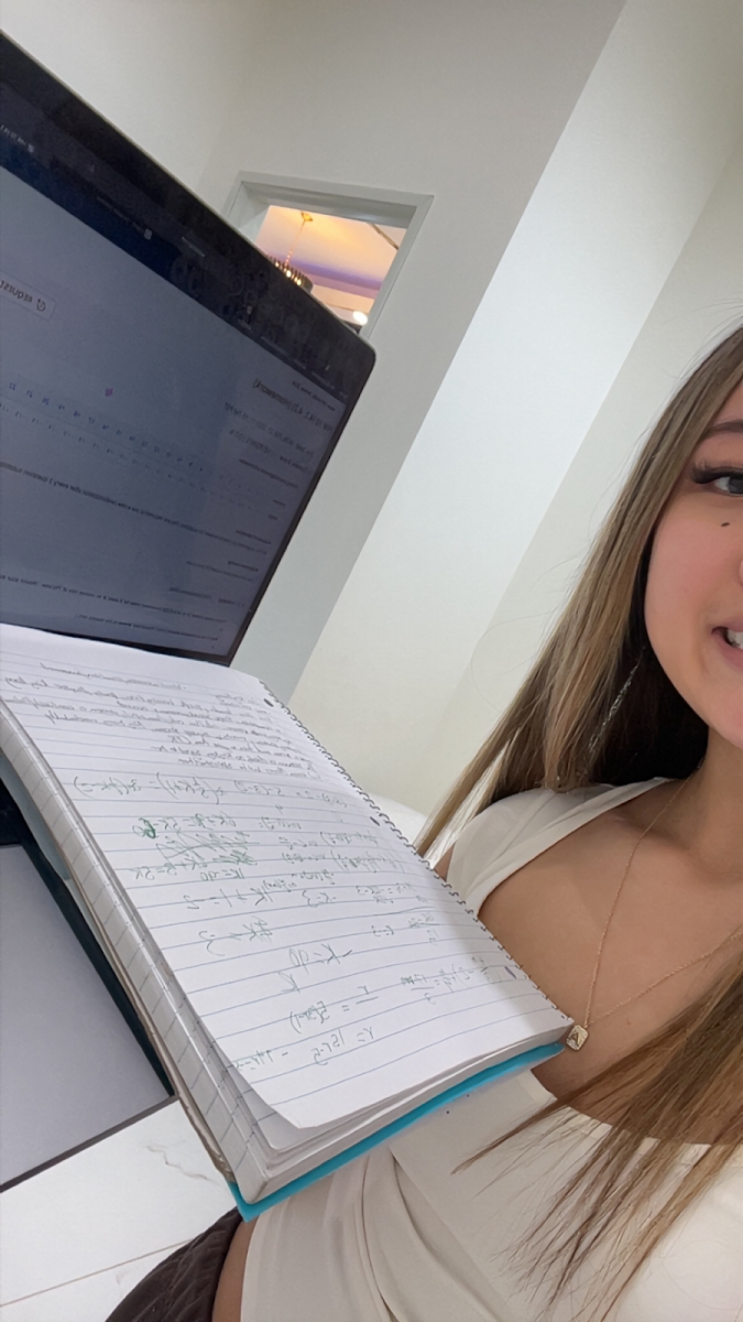 Allison Le working on her homework from her Clark  College class.