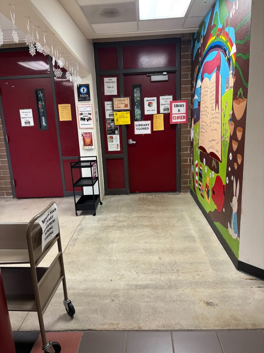 The school library doors closed for the week for SBAC testing. Books that need to be returned are put outside for students to return them. 
